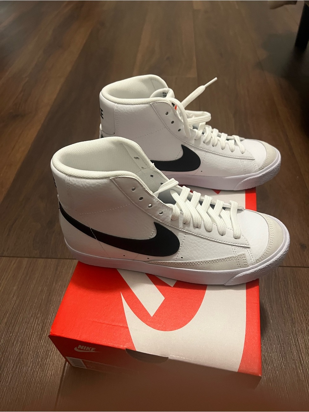 Nike Men’s White High-Top Sneakers with Black Swoosh
